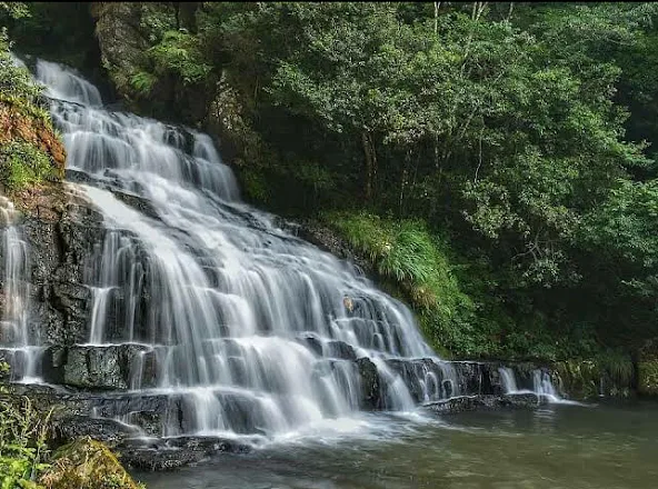 Elephant Falls, Shillong, three-tiered waterfall known in Khasi as Ka Kshaid Lai Pateng Khohsiew; the elephant-shaped rock it was named for was destroyed in the 1897 earthquake