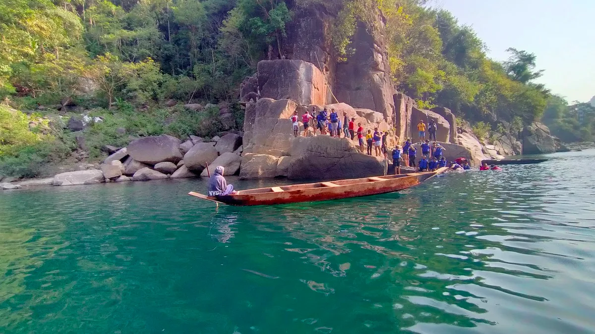 Shnongpdeng on the Umngot River near Dawki, Meghalaya, the clearest river in India with boats appearing to float on air